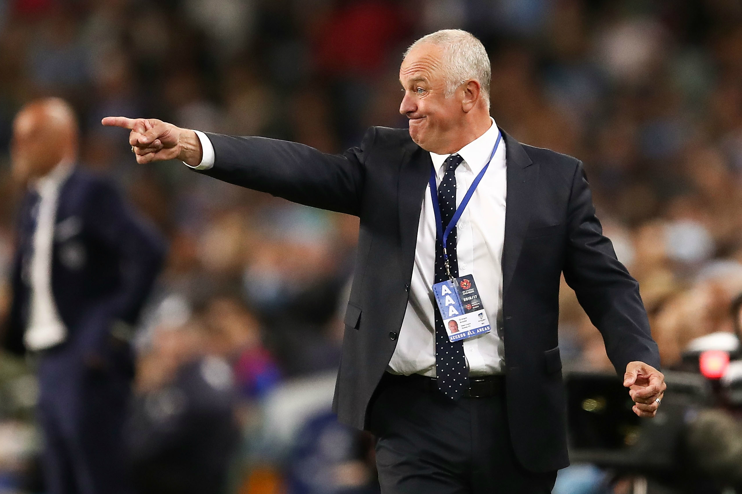 Graham Arnold issues instructions to his Sydney FC players