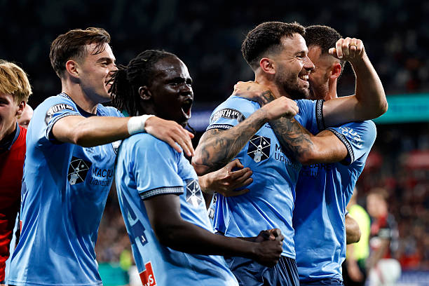 Apostolos Stamatelopoulos of Sydney FC celebrates scoring a goal with team mates during the round 24 A-League Men match between Western Sydney...