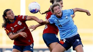 Riley Cohn of Sydney FC heads the ball at Sydney Olympic Park Athletic Centre.