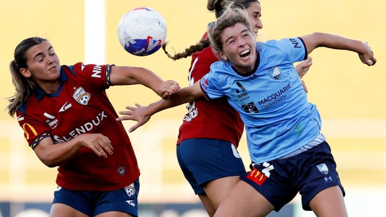 Riley Cohn of Sydney FC heads the ball at Sydney Olympic Park Athletic Centre.