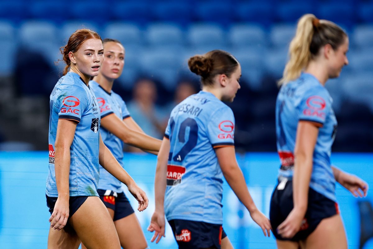 Sydney FC players react after conceding a goal at Allianz Stadium.